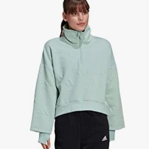 adidas Women's Aeroready Logo Jacquard Half-Zip Sweatshirt green tint in color